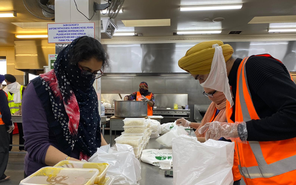 Image of Sikh volunteers preparing meals