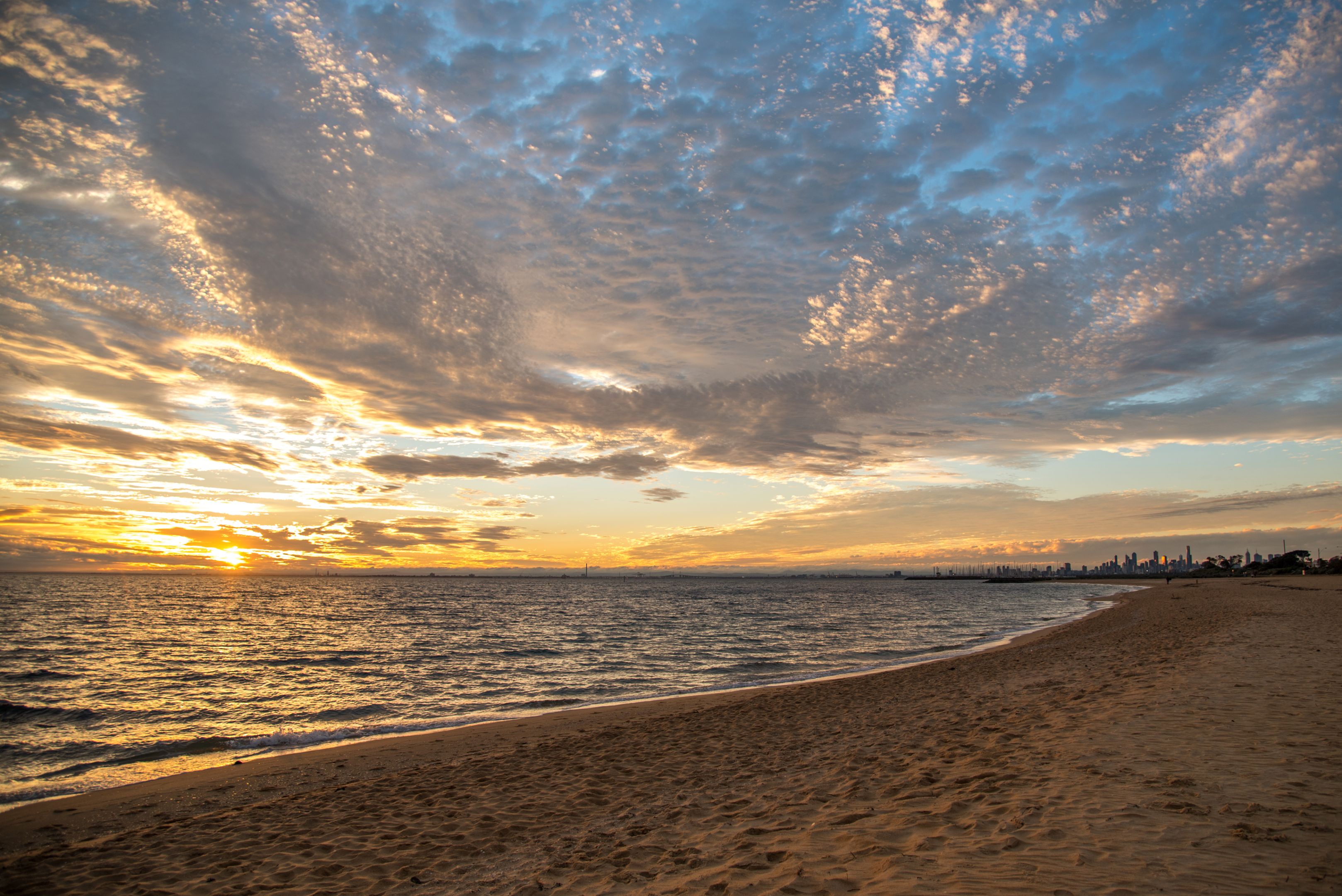 Sunset at Brighton Beach, Melbourne with the city in the background