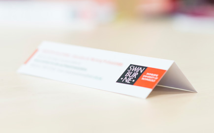 Swinburne name tag on a table