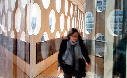 A woman walking through Swinburne's Advanced Technologies Centre