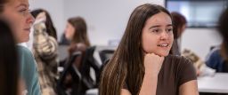 Female high school student listens intently while attending an immersive workshop as part of the 2023 Immersion Days held on Swinburne's Hawthorn campus.
