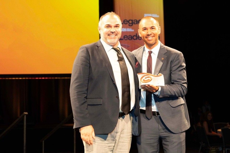 Moondani Toombadool Centre Director with Adam Davids, CEO of CareerTrackers, receiving the University Excellence Award at the 2026 National Gala Awards Night.  