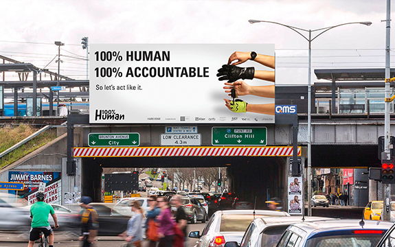 Re:act 100% Human Campaign billboard by Communication Design students Max Bufardeci, Riley van Ingen, Felicity Lemke and Caitlin Gmehling.