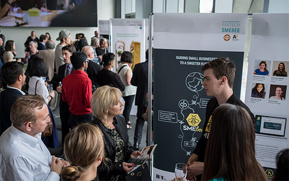 Networking in the exhibition space at Swinburne’s AMDC in 2017 