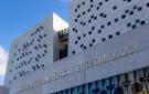 A low angle photograph of Swinburne University of Technology signage on the Advanced Technologies Centre building in Hawthorn.