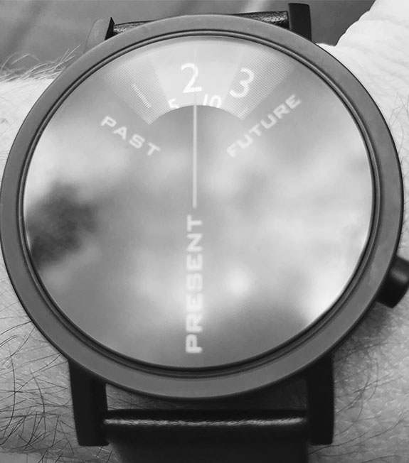 A watch on a wrist. 
