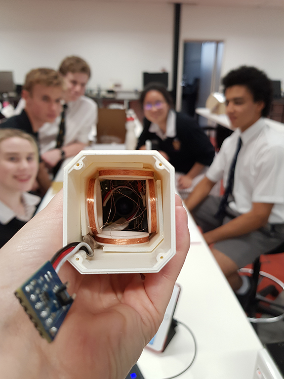 microgravity experiment with Haileybury students in background