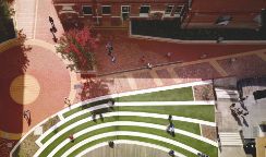 looking down to the stairs outside the ATC building with students walking and sitting