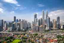 Aerial View of Kuala Lumpur Skyline during the day.