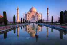 Taj Mahal reflect in sunrise colors