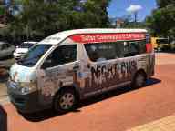 A van parked on a brick road