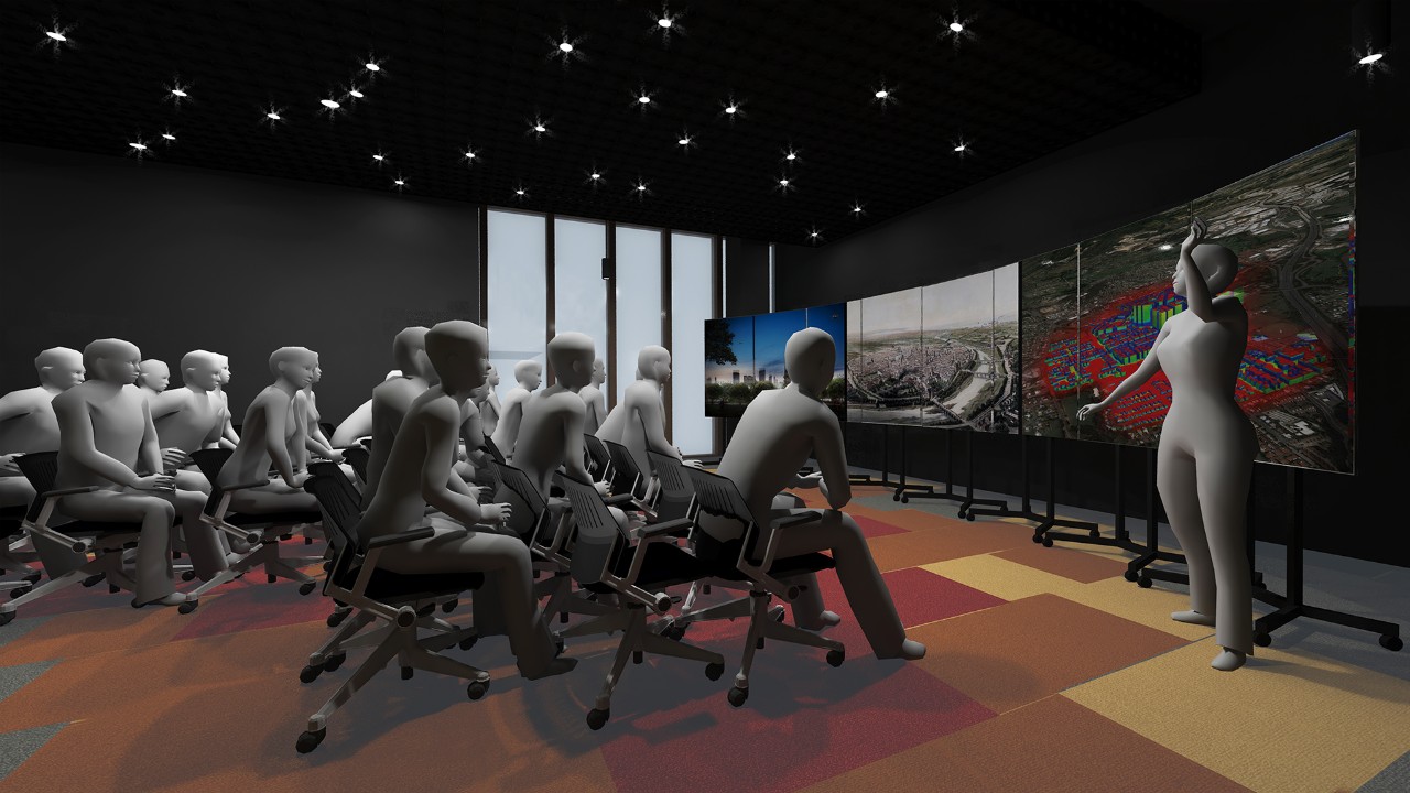 A computer-generated image showing a large office space with numerous people seated in office chairs facing one person standing in front of them who is gesturing to images of various city skylines displayed on three large screens behind them. 