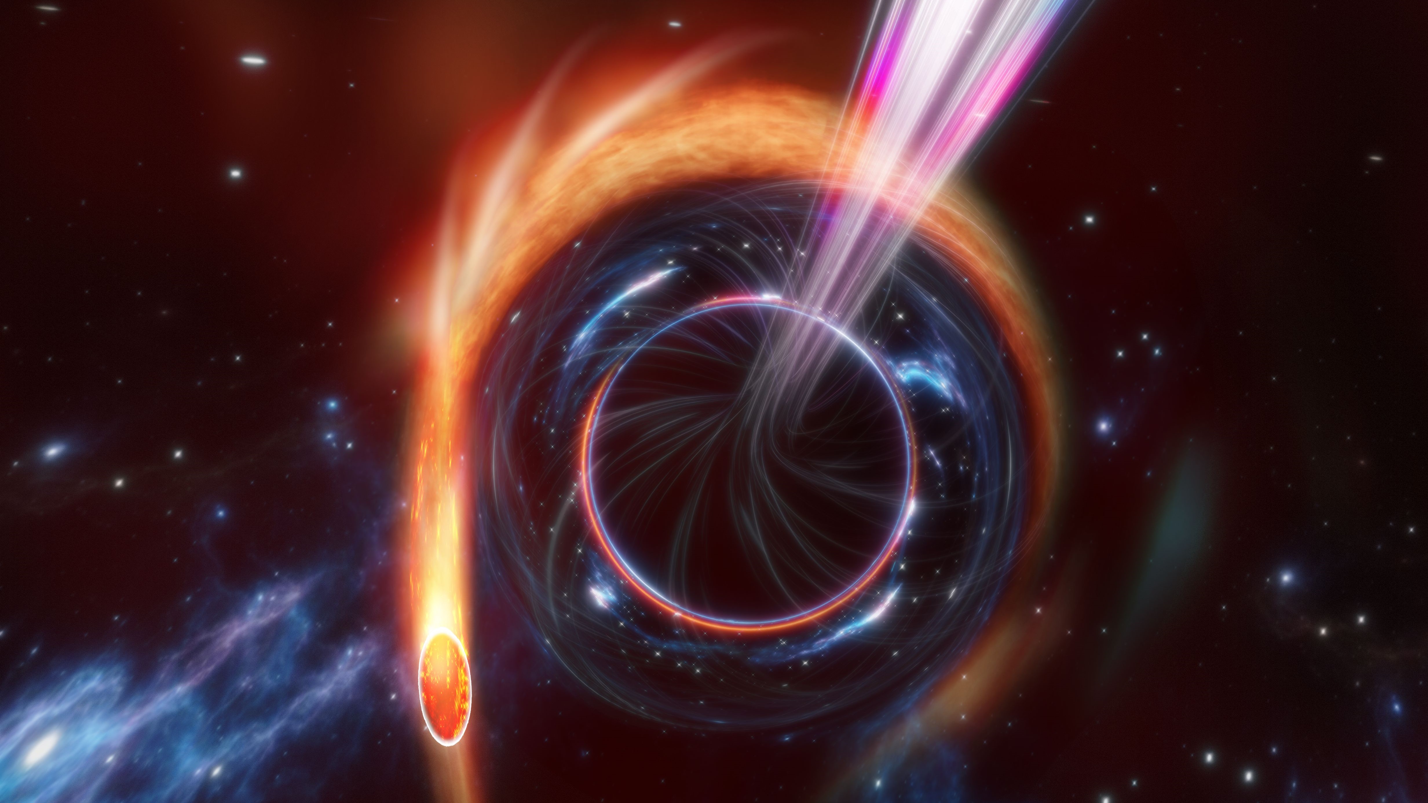 A supermassive black hole rips apart a star, causing a bright optical flare to shoot out