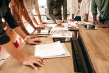 Forbes leadership - hands on table