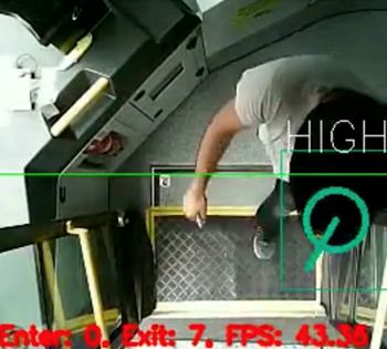 Example of real-time video-based passenger analytics showing a person stepping out of a bus.