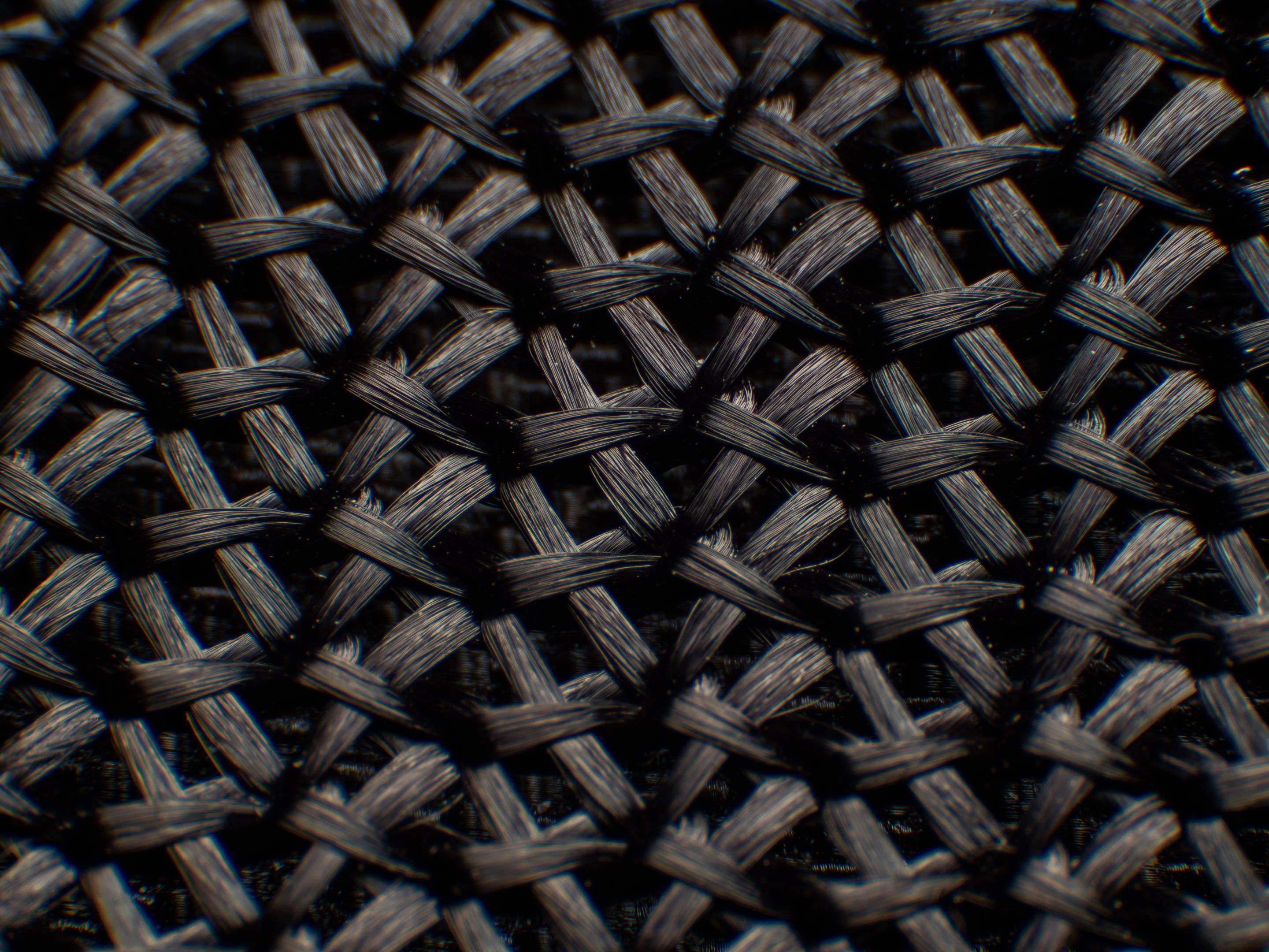 Synthetic fabric seen under magnification, showing the ordered, interlocked nature of the fabric.