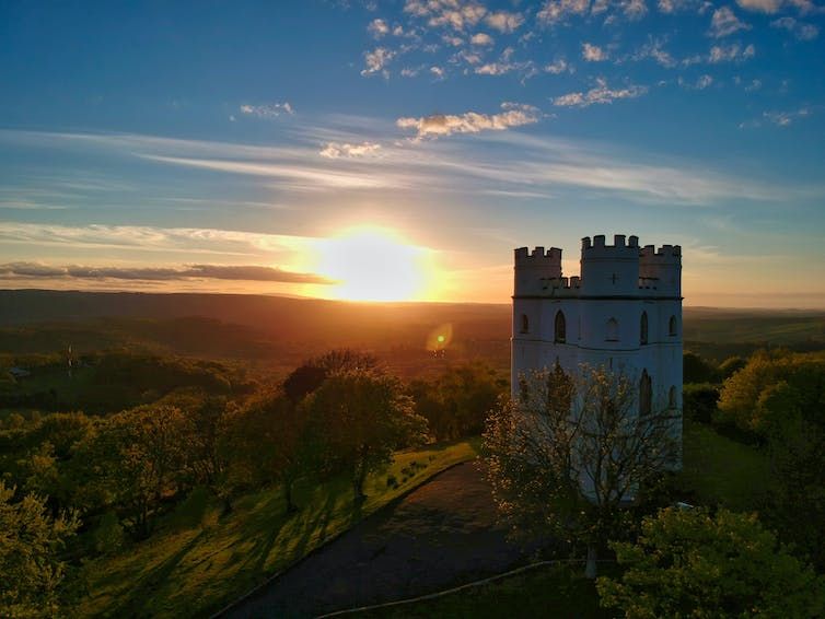 Castle on a hill at sunset 