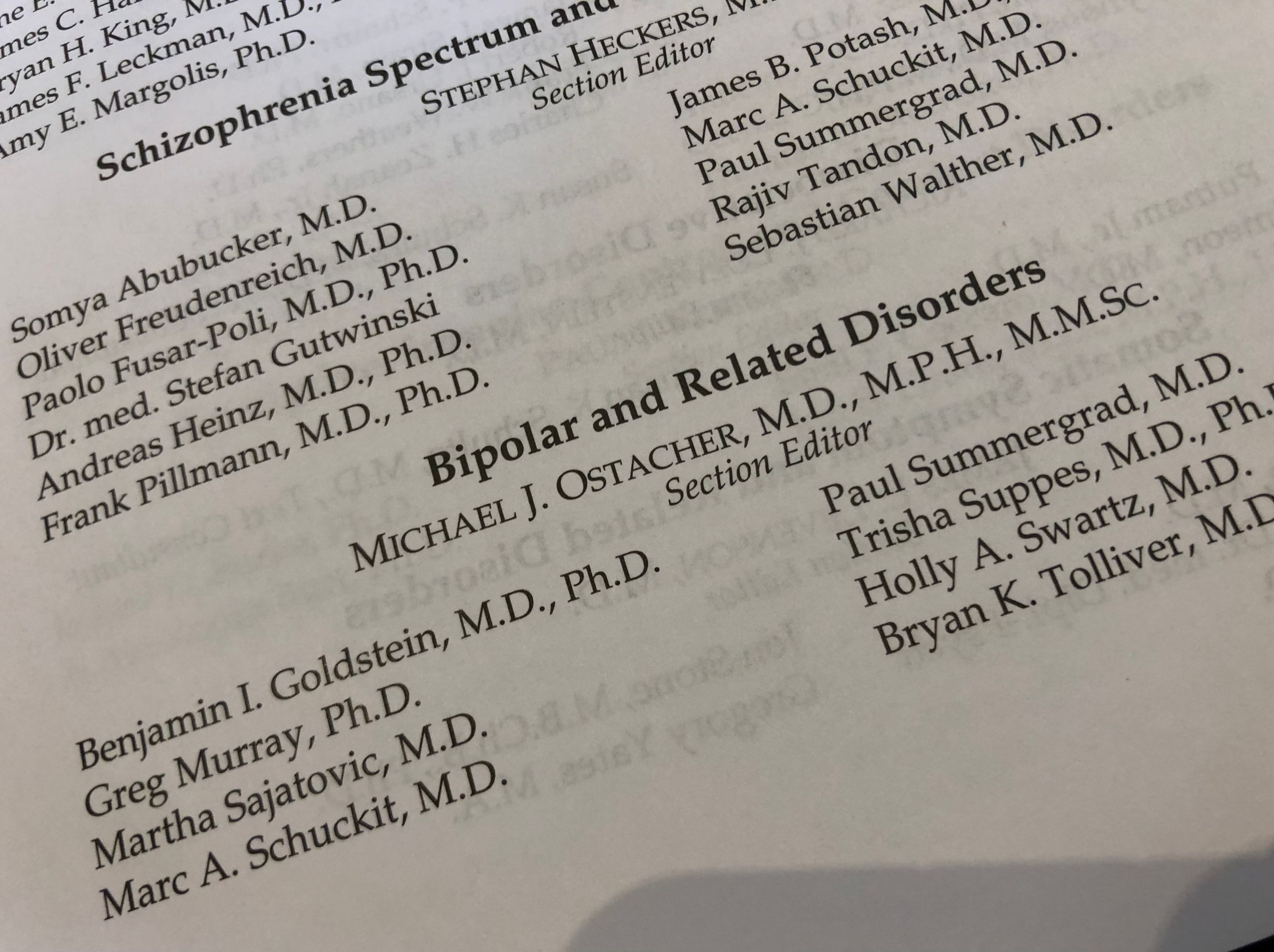 List of authors of the Diagnostic and Statistical Manual of Mental Disorders (DSM-5-TR), including Swinburne's Professor Greg Murray listed under 'Bipolar and related disorders'