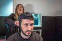 A psychology lecturer demonstrated a brain map on a student