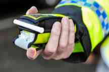 PSNI announce new powers to randomly stop drivers and perform drink driving breathalyser tests, Northern Ireland.