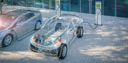 A transparent electric vehicle charging, showing its components that make up the car