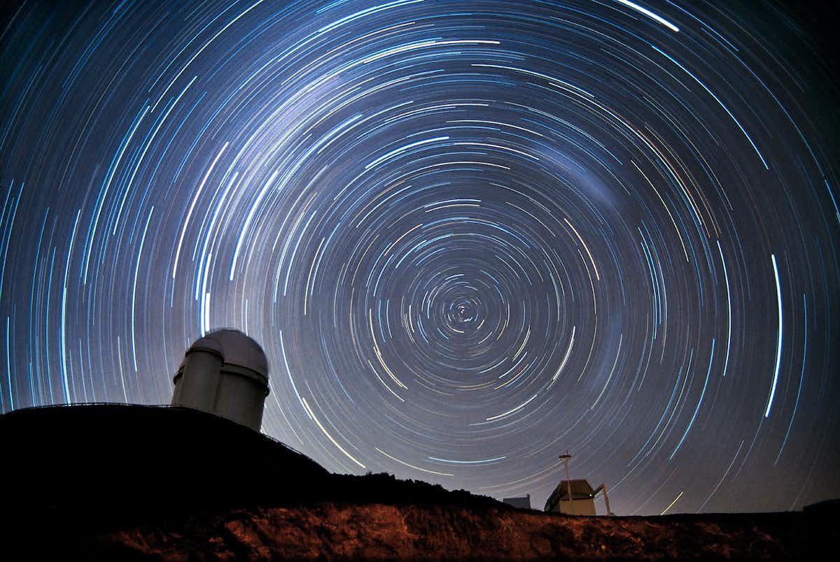 Long exposure image of the night sky and the oberservatory in Chile
