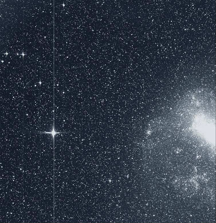 In August, the TESS telescope took this snapshot of the Large Magellanic Cloud (right) and the bright star R Doradus (left). NASA/MIT/TESS