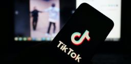 A phone with the TikTok branding visible 