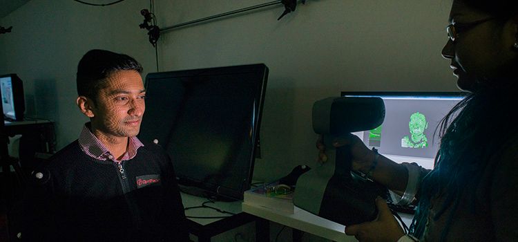 Researcher creating a virtual image of a person's head