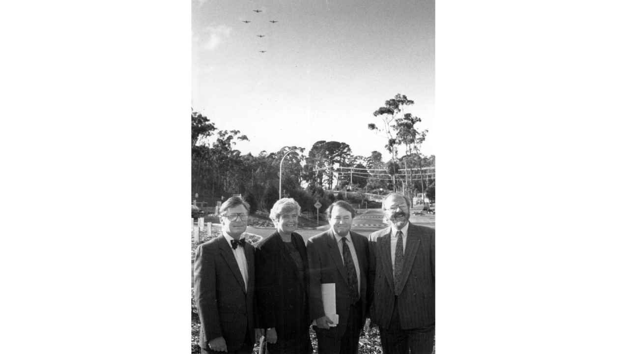 (Left to right) Director Swinburne, Professor Iain Wallace, MLA Carolyn Hirsch, Minister for Post-Secondary Education, Hon. Tom Roper and Associate Professor Bruce McDonald at the Proclamation of Swinburne University, 1992. Celebrations at the Eastern Campus included flypasts by members of the Moorabbin Aviation Academy.   