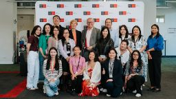 Vice-Chancellors Accountable Award winners 2025 - International Recruitment and Admissions posing with the VC and their trophy