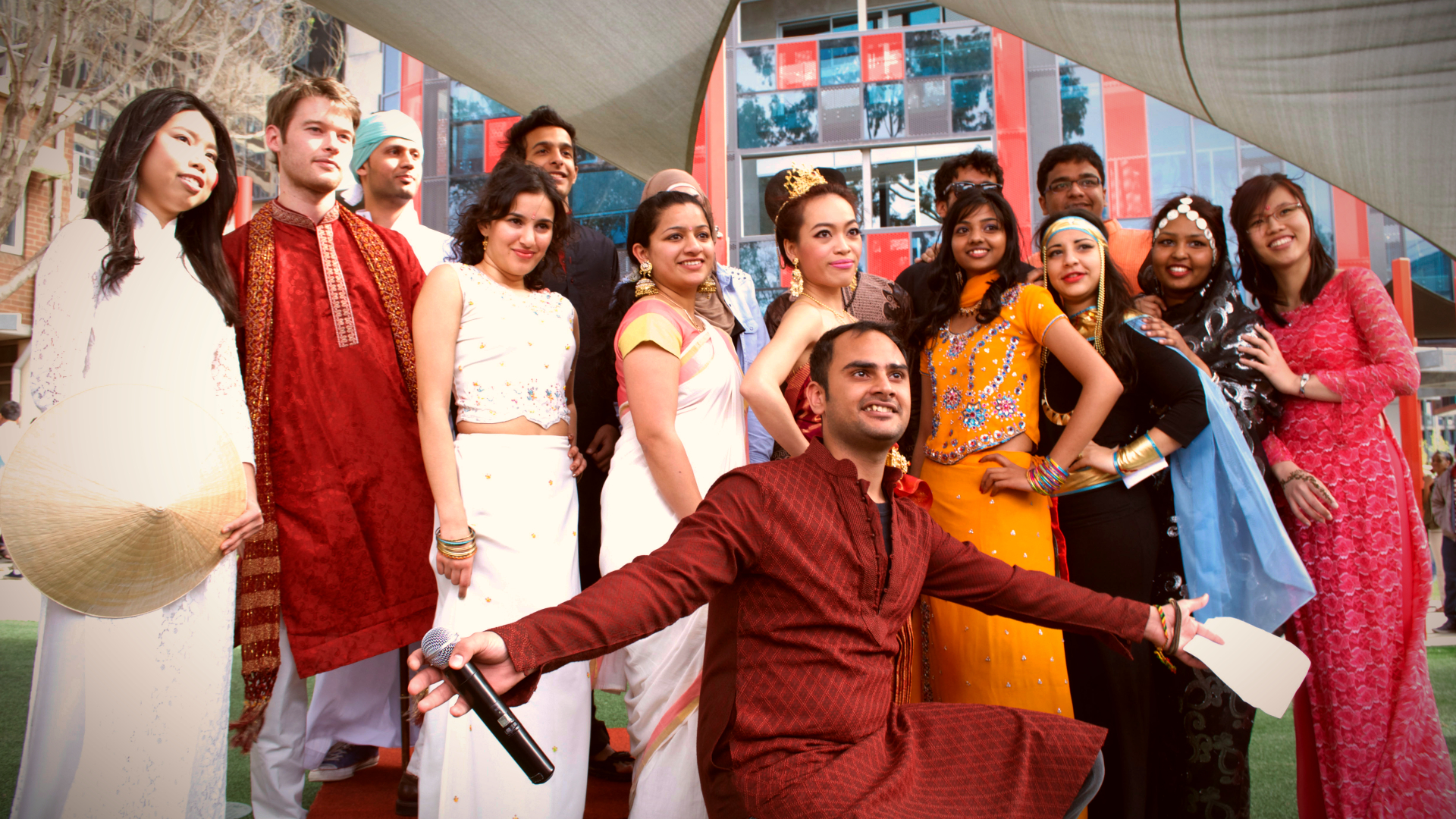 Students wearing traditional outfits from various cultures on Hawthorn campus