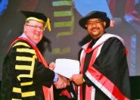 Dr Muhammad Khusair (Swinburne Sarawak Alumni) at his graduation ceremony, receiving his PhD & Master of Engineering. 