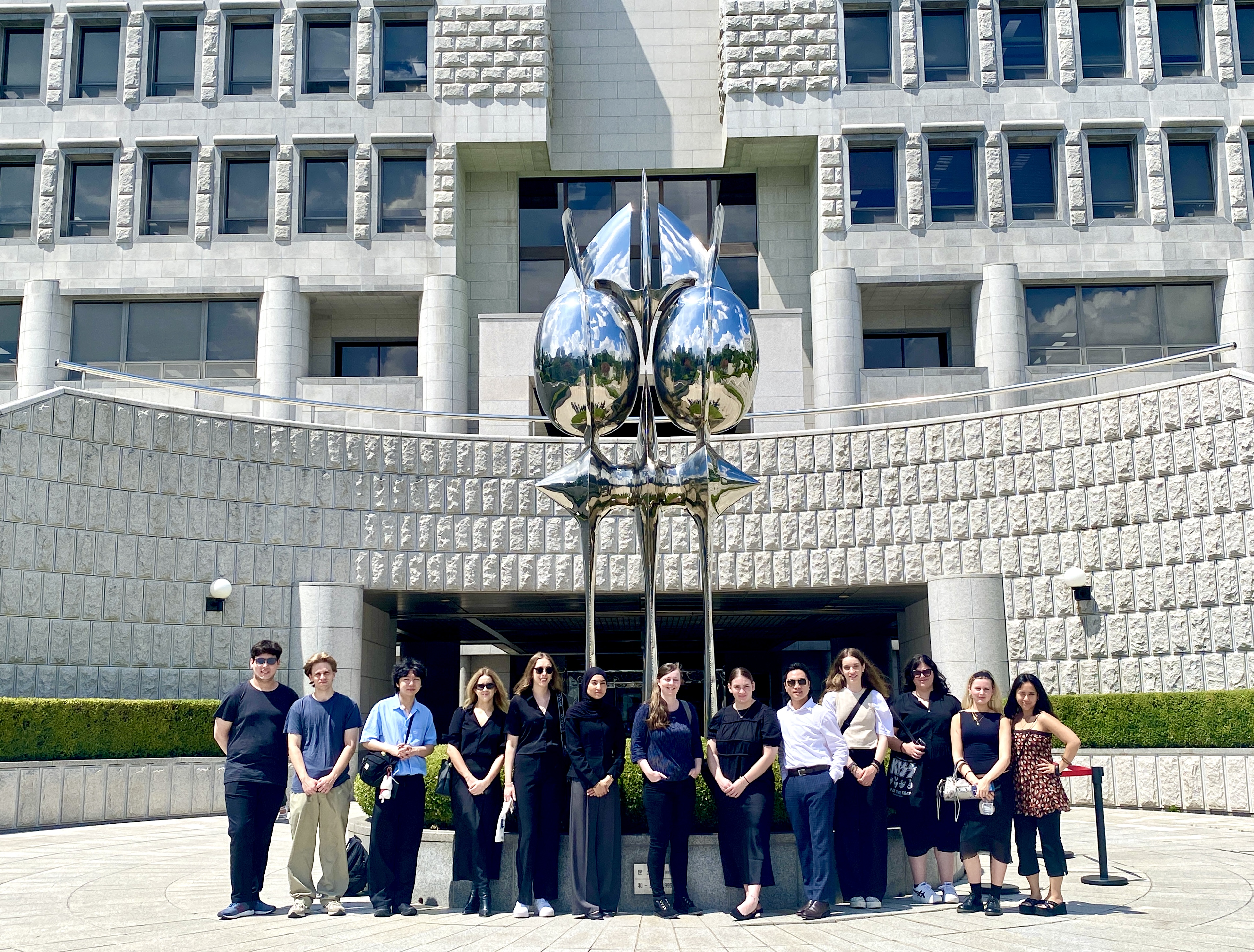 Law students standing in a line outside the Supreme Court of Korea