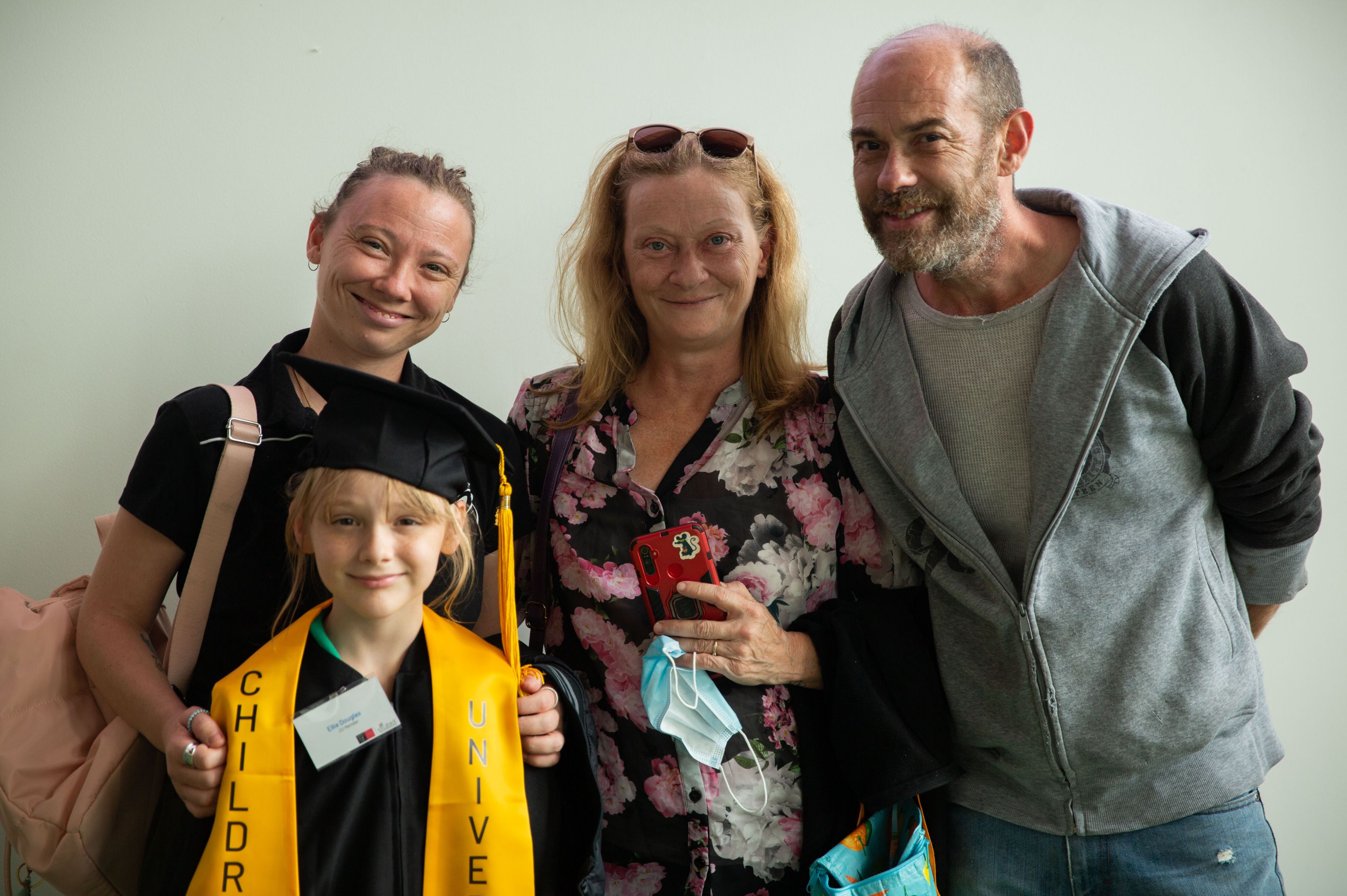 A young Children's University Swinburne member and her proud family. 