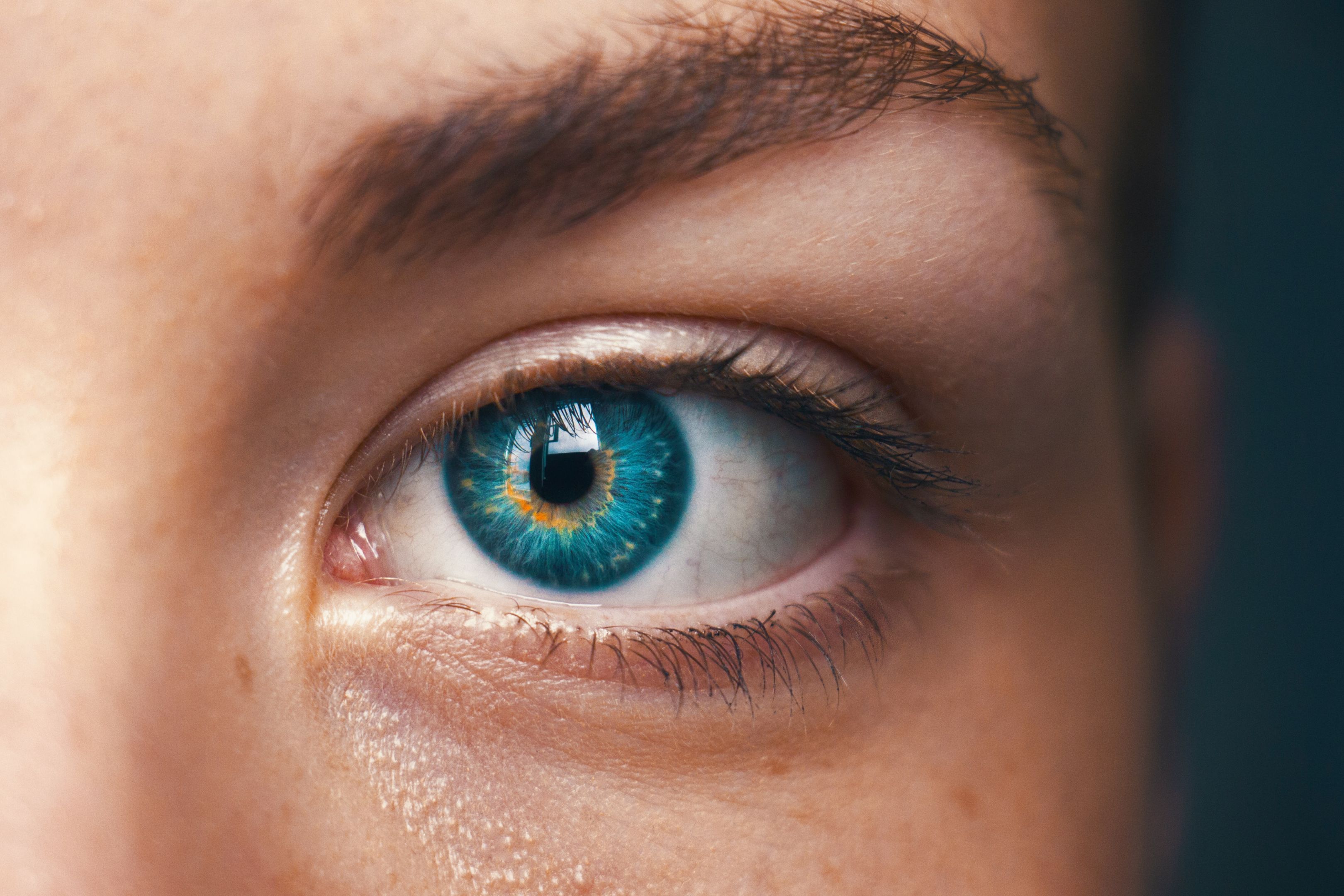 Close up of a woman's blue eye
