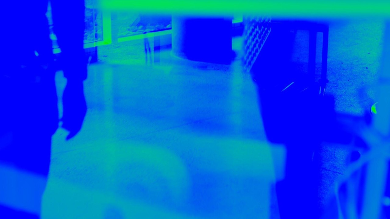 Experimental artwork with blue light effects and abstract forms.