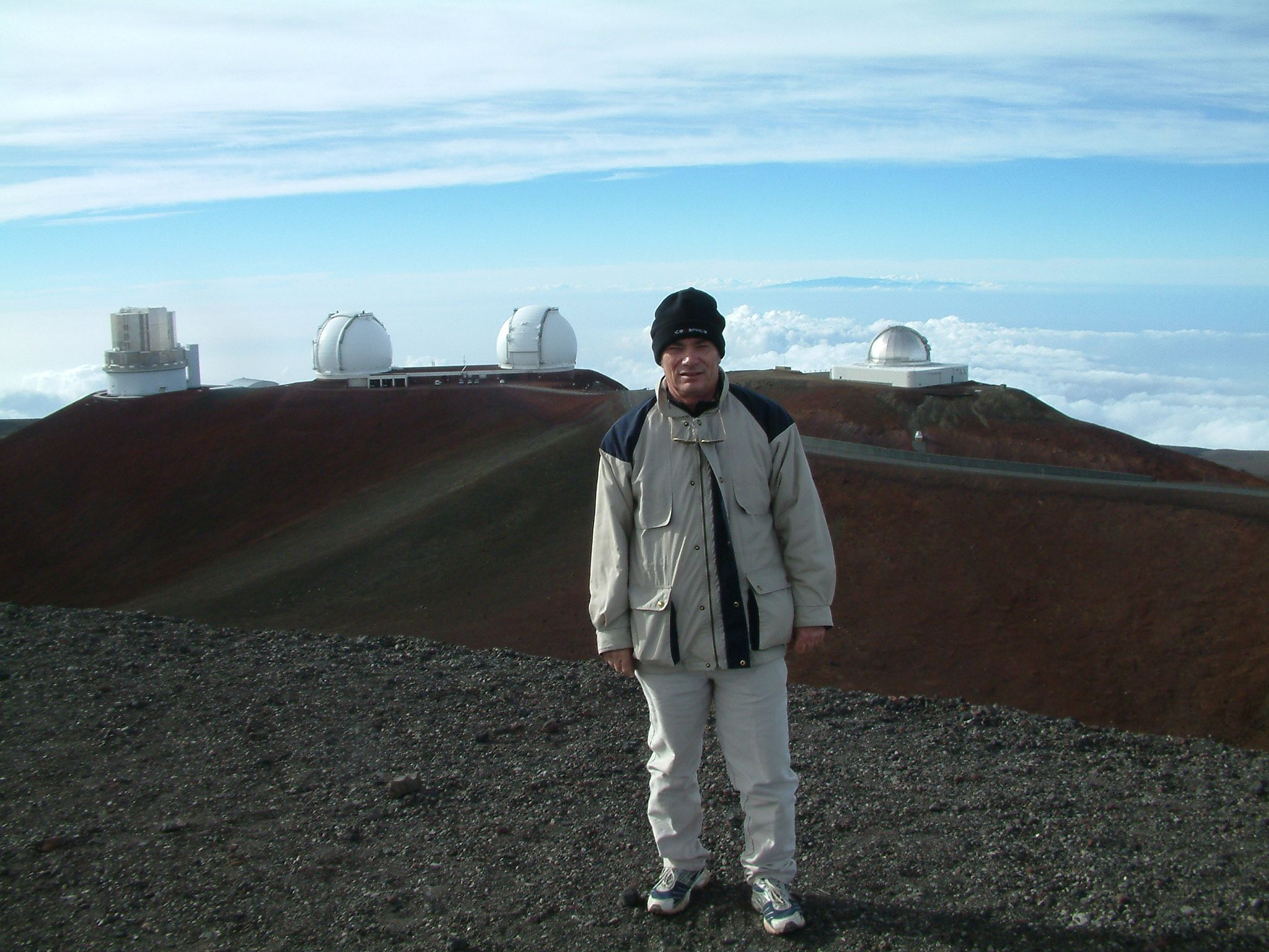 Photograph of Swinburne alumnus Trevor Barry standing outdoors in a beanie, jacket and pants.