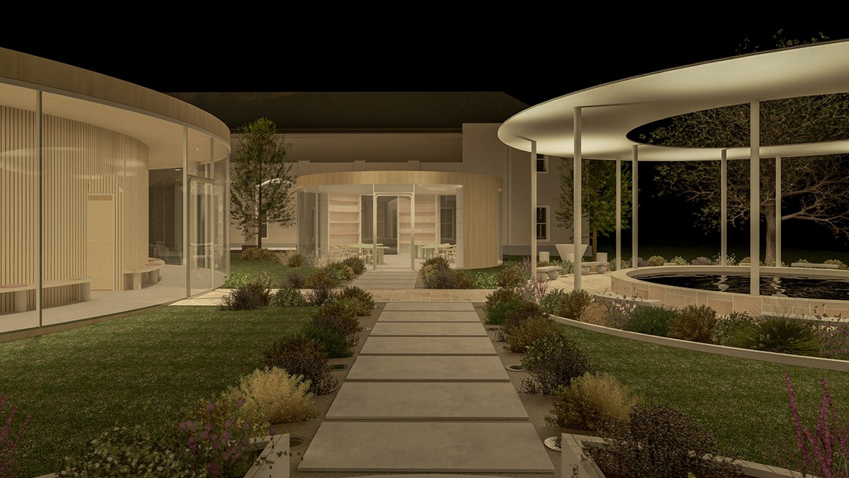 Render of path through an outdoor courtyard at night with a circular water feature on one side and a pavilion on the other