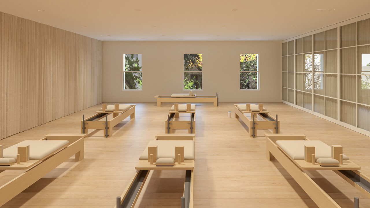 An interior design render of a well being centre with individual pilates machines.