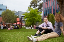 Two students sitting together in wakefield gardens