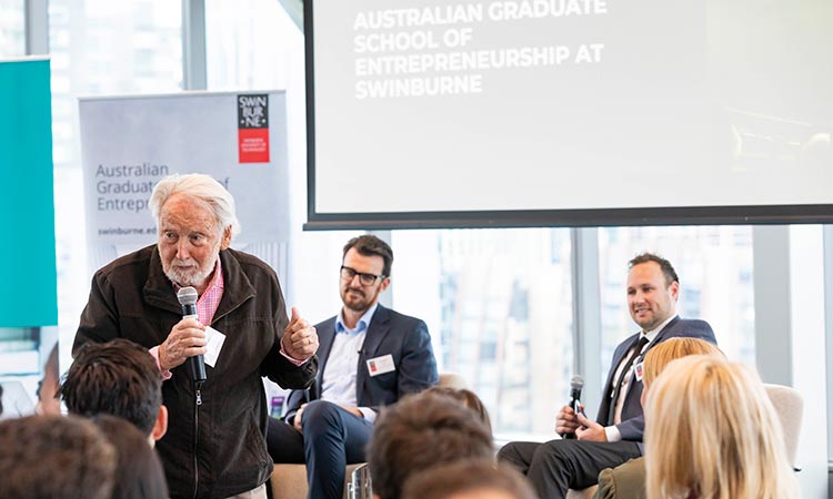 Gallery IMG: Future of Leadership - an older gentleman asks the presenters a question