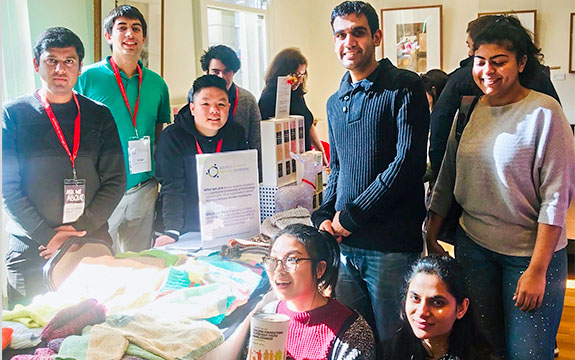 Business without Borders students at a knitting event. 