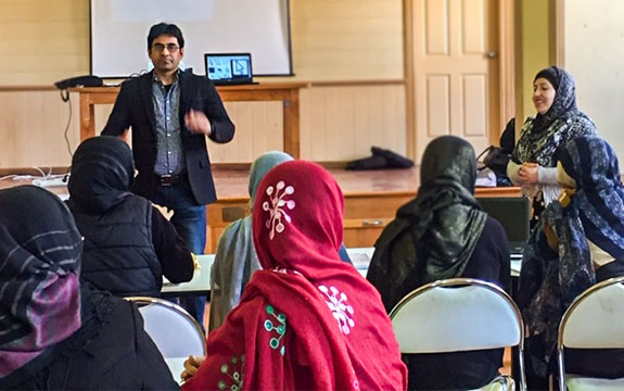 Dr Ashir Ahmed teaches a group of women in Dandenong, Victoria.
