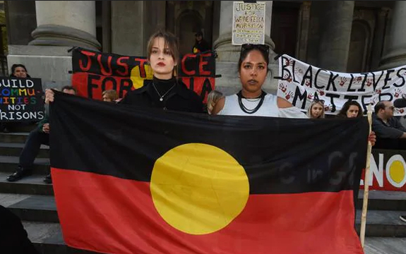 Protesters marching against Aboriginal deaths in custody